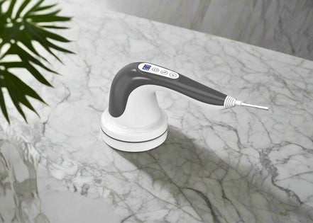 Handheld electronic device with a white base and black handle 