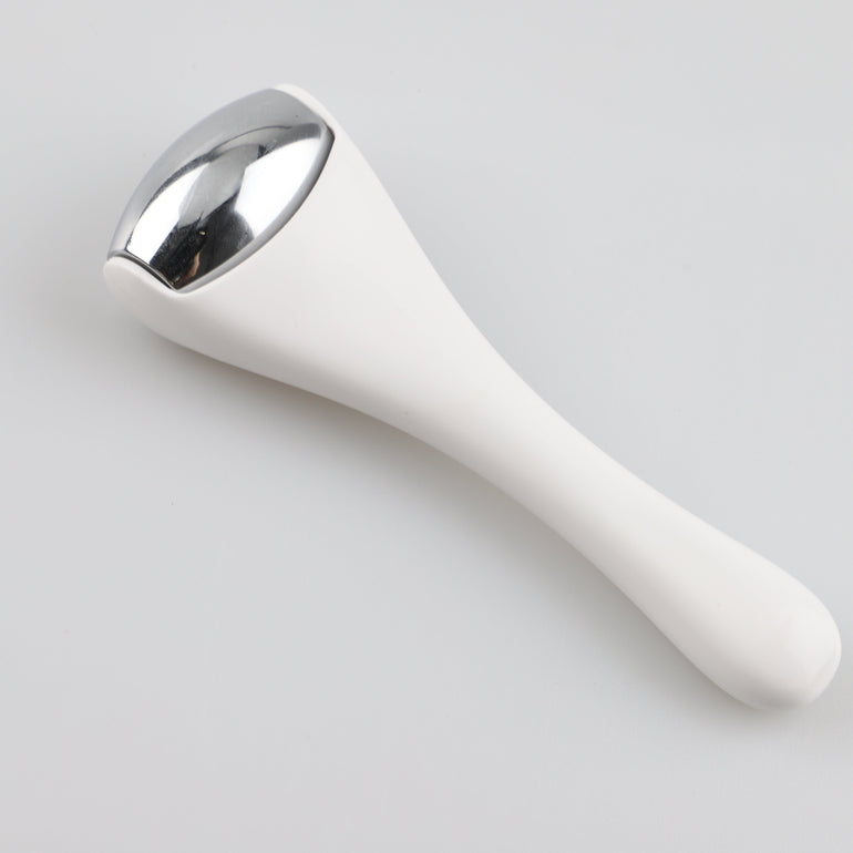 white face roller on a light gray background