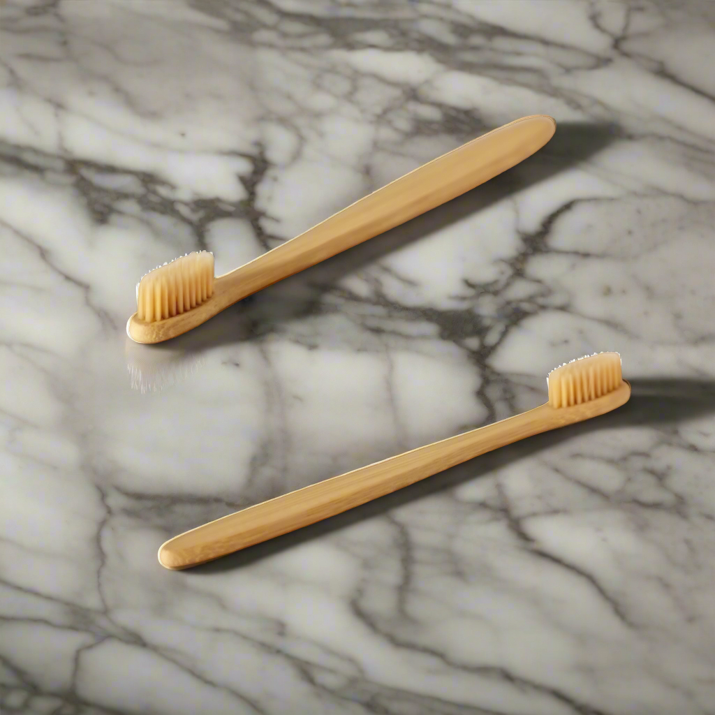 Two bamboo toothbrushes on a white background with a green circular border.