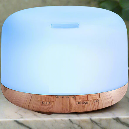 Blue and wooden diffuser on a white background
